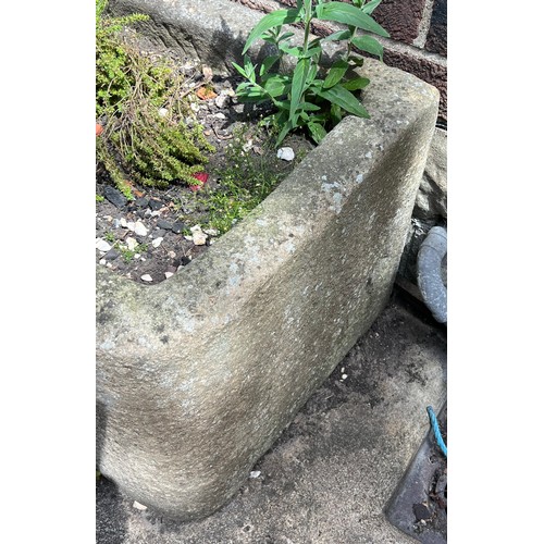 211A - A stone trough 80cms w x 53cms d x 46cms h.