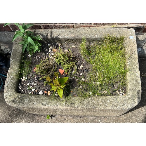 211A - A stone trough 80cms w x 53cms d x 46cms h.