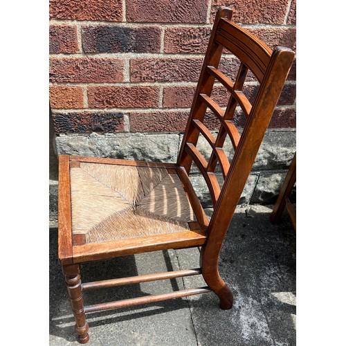 189 - A single mahogany chair with rush seat.