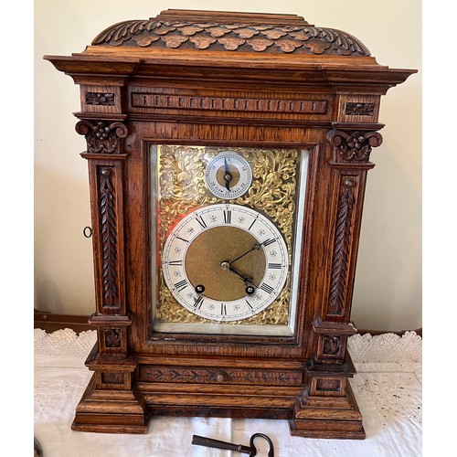 1045 - Well craved oak chiming bracket clock retailed by G.Whitfield, works marked Lenzkirch A G U 1 millio... 