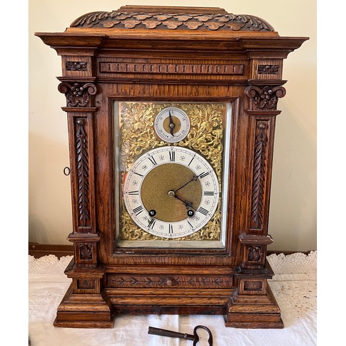 1045 - Well craved oak chiming bracket clock retailed by G.Whitfield, works marked Lenzkirch A G U 1 millio... 