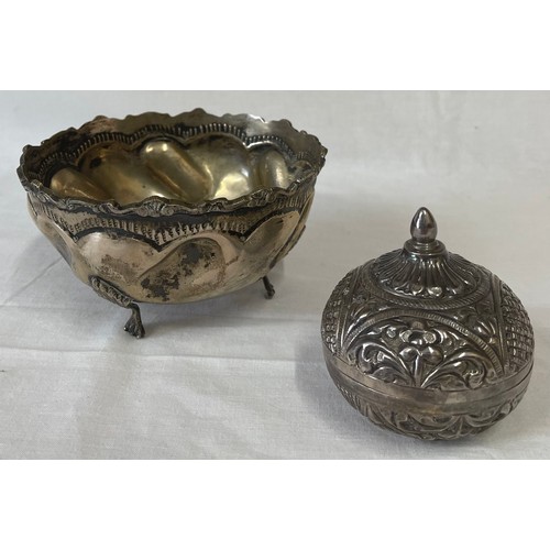 859 - Two Continental silver items to include a tri-foot bowl with pressed design, AR 800 marked to inside... 