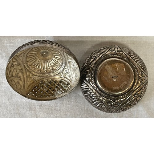 859 - Two Continental silver items to include a tri-foot bowl with pressed design, AR 800 marked to inside... 