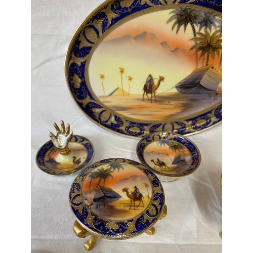 440 - A mixed lot to include a Noritake Egypt scene dressing table set, tray 29cms l, hand ring dish, trin... 