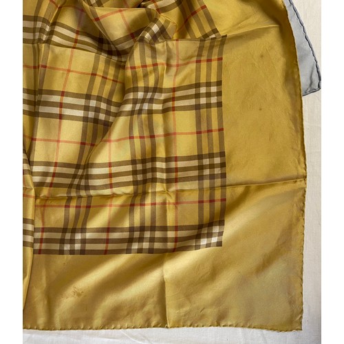 753 - A collection of seven Silk scarf to include 2 x Burberry with the classic check pattern, 2 x Liberty... 