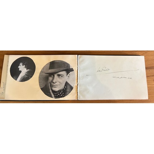 1054 - An autograph book with multiple autographs to include John Gielgud etc.