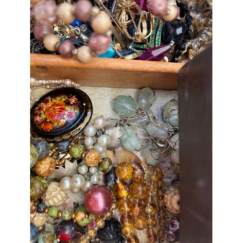 531 - A large quantity of vintage costume jewellery, jewellery and scent bottle boxes to include beads, br... 