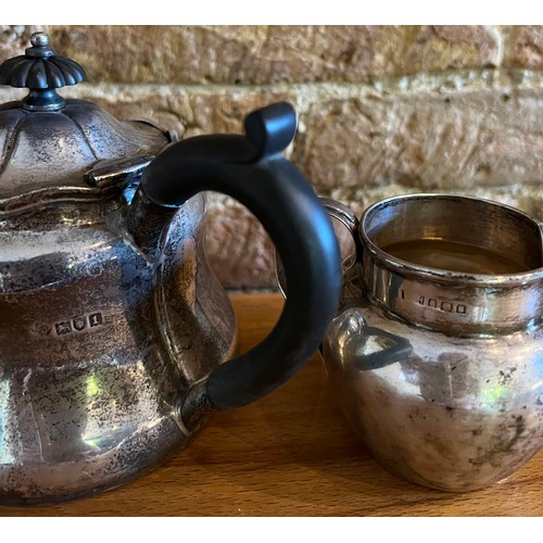 894 - Silver teapot with ebony knop and handle, London 1906, maker Horace Woodward & Co Ltd, with a silver... 