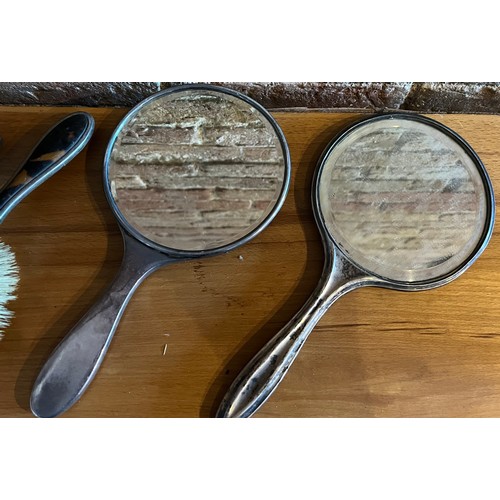 895 - Two part dressing table sets, one silver backed mirror and 2 hairbrushes Birmingham 1910, the other ... 