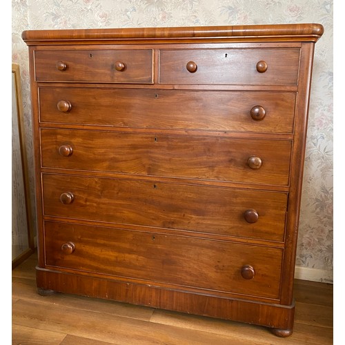 118 - A 19thC mahogany chest of 2 short over 4 long drawers with wooden knobs and bun feet. 126 w x 53 d x... 