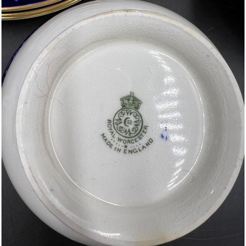 389 - Royal Worcester part tea service comprising 2 x large plates, 11 x tea plates, 12 x saucers, 11 x cu... 