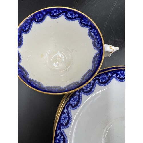 389 - Royal Worcester part tea service comprising 2 x large plates, 11 x tea plates, 12 x saucers, 11 x cu... 