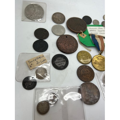 670 - British continental and world coins to include Sweden Karl XI 1686, Marie Therese Thaler 1780, Whitb... 