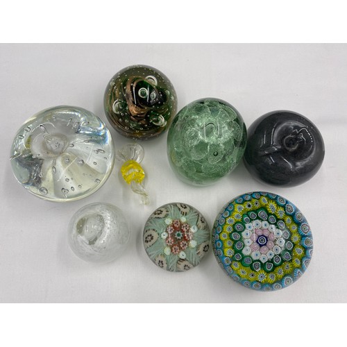 496 - A collection of 7 paperweights to include a Yorkshire Dump 19cm h, 2 x Millefiori (one Scottish), Ca... 