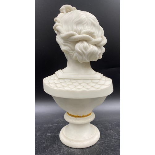 366 - A male Parian bust with snakes to hair and decorative uniform. 23cm h.