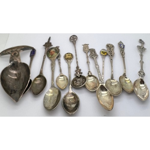 908 - Thirteen various commemorative spoons to include .800 silver and white metal contained in a non rela... 