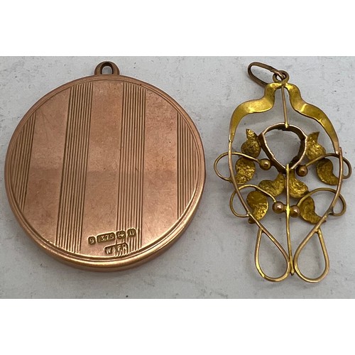 594 - A 9ct gold  photograph size locket together with a 9ct gold pendant. Total weight 11.7gm.