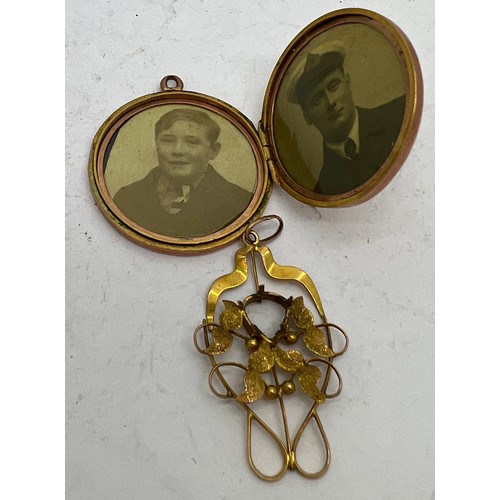 594 - A 9ct gold  photograph size locket together with a 9ct gold pendant. Total weight 11.7gm.