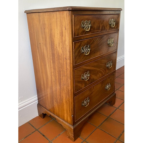 125 - A 20thC four height mahogany chest of drawers on bracket feet and brass handles. 82 h x 57.5 w x 40c... 