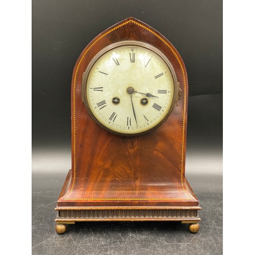 1040 - Mahogany mantle clock with French movement marked Paris 1900. 29cm h.