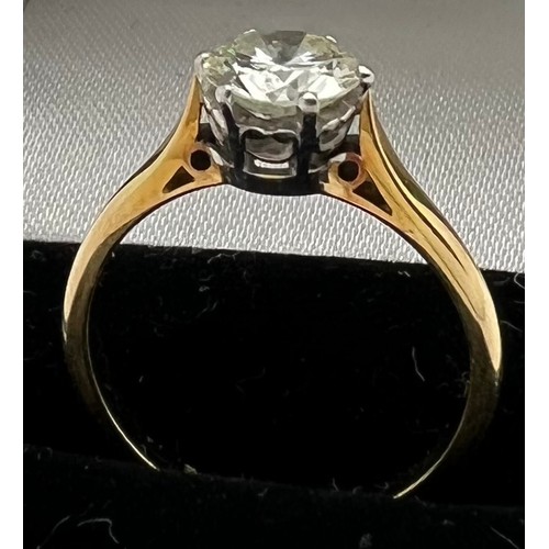 598 - A diamond solitaire approx. .89ct set in 18ct gold and platinum, Size M. Total weight 3.4gm.