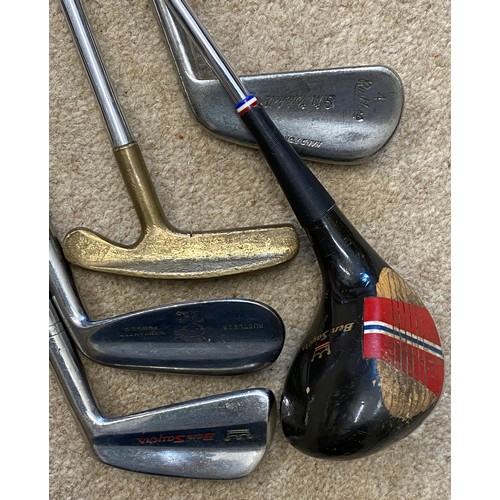 1089 - A collection of golf clubs to include a selection of various irons of different makes with bag and b... 