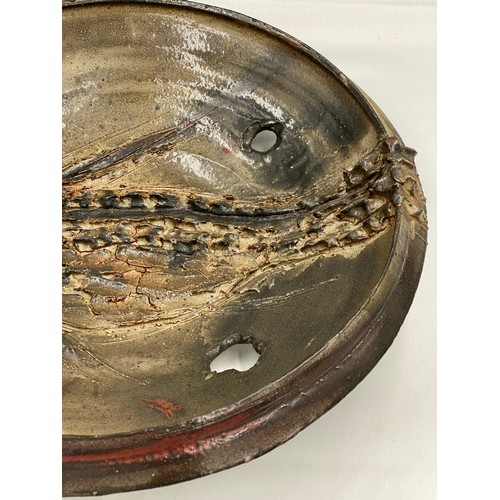 376 - Charles Bound (b.1939) Large wood fired bowl of abstract design with holes and fish design with impr... 