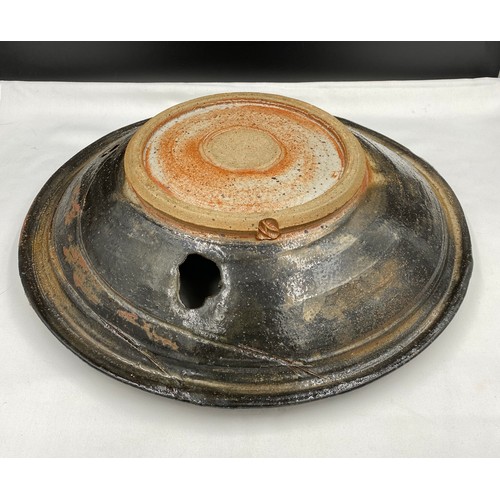 376 - Charles Bound (b.1939) Large wood fired bowl of abstract design with holes and fish design with impr... 