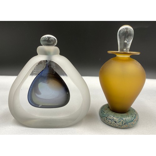 489 - Three glass perfume bottles, to include a Sommerso bottle 11cm h together with a Caithness vase 11cm... 