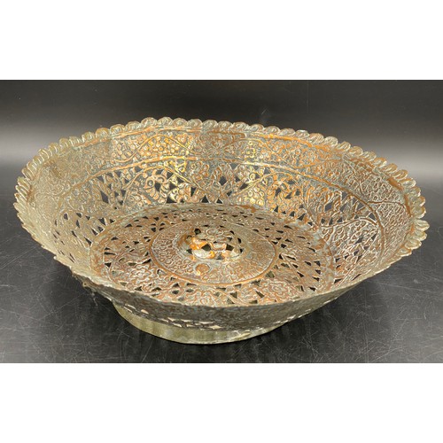 770 - A silver plate and copper pierced bowl with foliate and floral decoration. 32.5cm d .