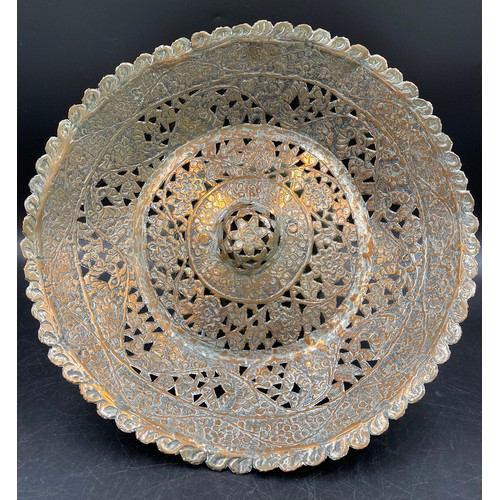 770 - A silver plate and copper pierced bowl with foliate and floral decoration. 32.5cm d .