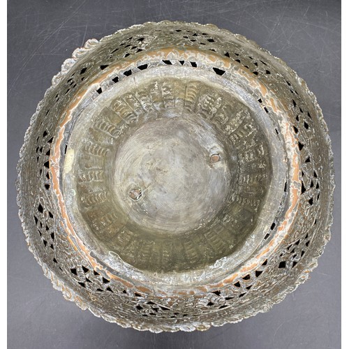 770 - A silver plate and copper pierced bowl with foliate and floral decoration. 32.5cm d .