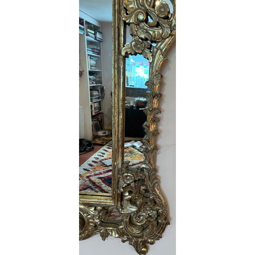 1150 - A 20thC decorative wall mirror 156 h x 97cm w.