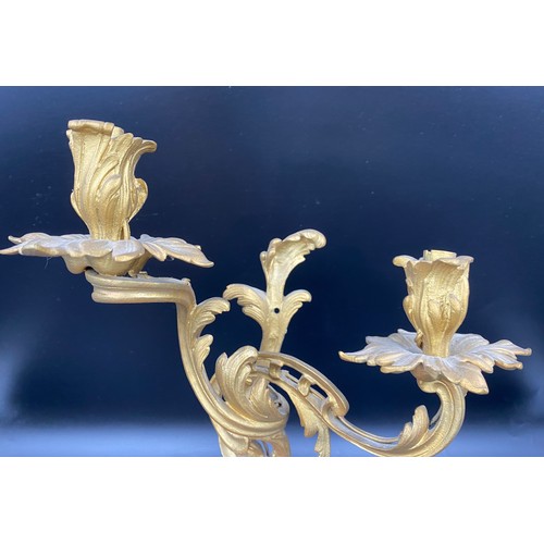 1072 - A pair of French metal and gilt two branch wall sconces. 37cm h approx.