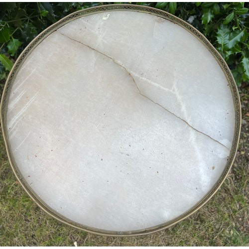 130 - Continental marble topped table with brass galleried top and decorative brass fittings.