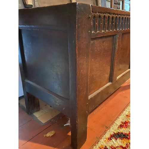 131 - An 18thc oak coffer with carved decoration to frieze. 118 l x 51 d x 70cm h.