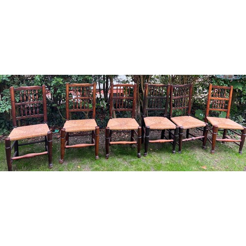 133 - Set of 6 elm spindleback chairs with rush seats.