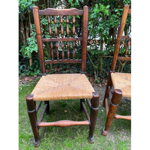 133 - Set of 6 elm spindleback chairs with rush seats.