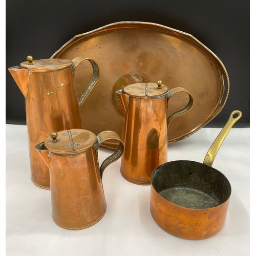 935 - Various copper ware to include a twin handled tray 47cm, 3 graduating lidded jugs tallest 26cm h and... 