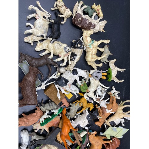 971 - A quantity of farm animals and models to include some lead models.