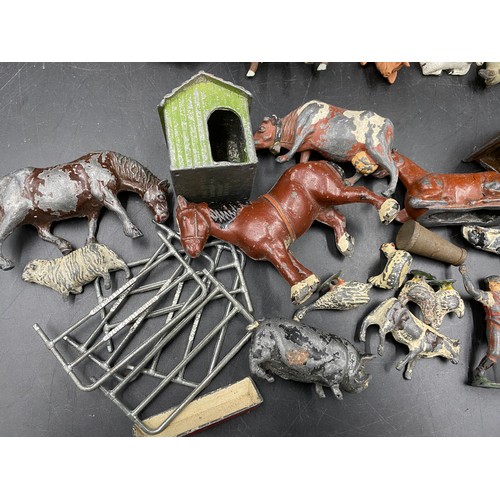 971 - A quantity of farm animals and models to include some lead models.