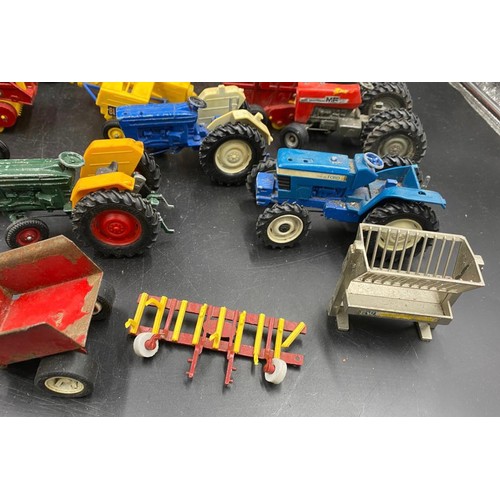 972 - A collection of Britains diecast toys to include Vermeer Round Baler x 2, MF200 Massey Ferguson Trai... 