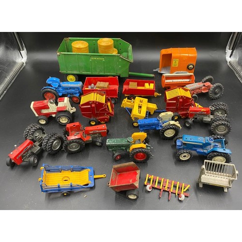 972 - A collection of Britains diecast toys to include Vermeer Round Baler x 2, MF200 Massey Ferguson Trai... 