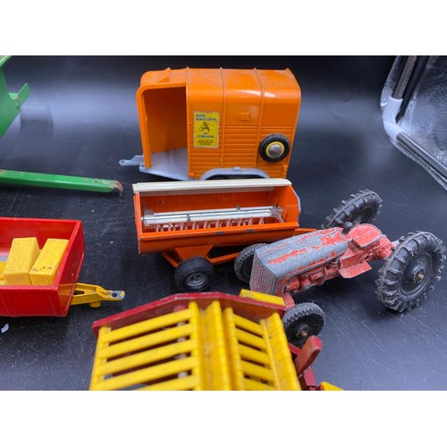 972 - A collection of Britains diecast toys to include Vermeer Round Baler x 2, MF200 Massey Ferguson Trai... 