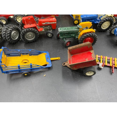 972 - A collection of Britains diecast toys to include Vermeer Round Baler x 2, MF200 Massey Ferguson Trai... 