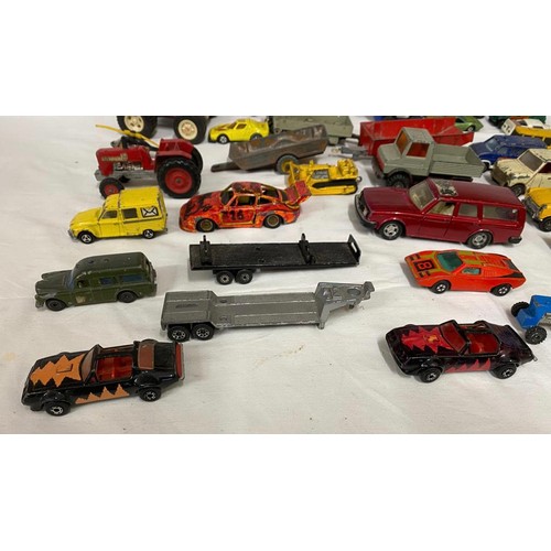 973 - A collection of diecast toys to include Dinky trailer, Matchbox Super Kings trailer, Corgi British L... 