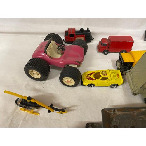 973 - A collection of diecast toys to include Dinky trailer, Matchbox Super Kings trailer, Corgi British L... 