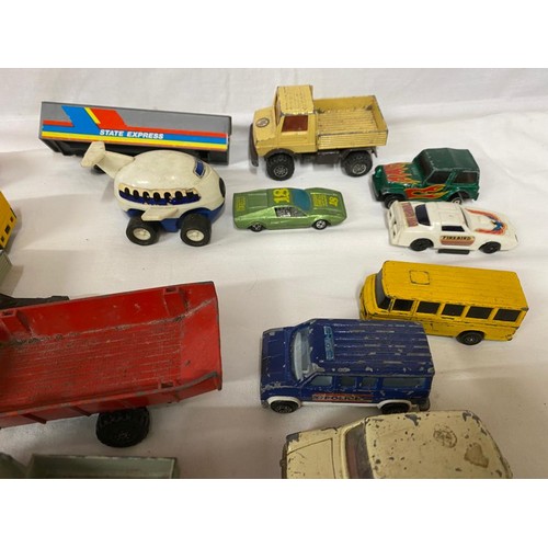 973 - A collection of diecast toys to include Dinky trailer, Matchbox Super Kings trailer, Corgi British L... 