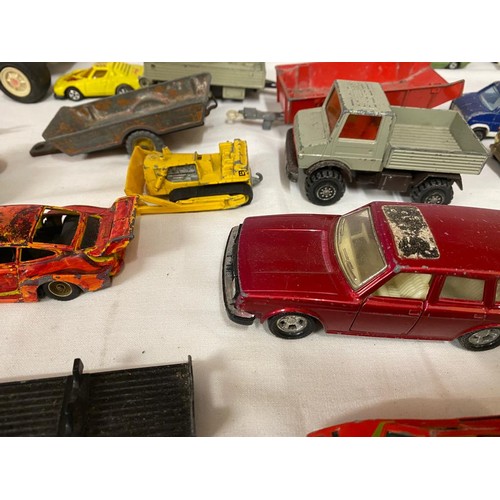 973 - A collection of diecast toys to include Dinky trailer, Matchbox Super Kings trailer, Corgi British L... 