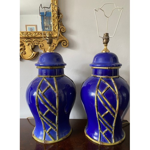 1070 - A pair of large blue contemporary ceramic tables lamps with bamboo relief detail. 52cm to top of fit... 